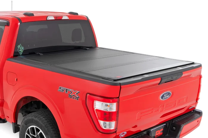 Rough Country 49220550 Hard Tri-Fold Flip Up Bed Cover | 5’7″ Bed | Ford F-150 2WD/4WD (2015-2020)